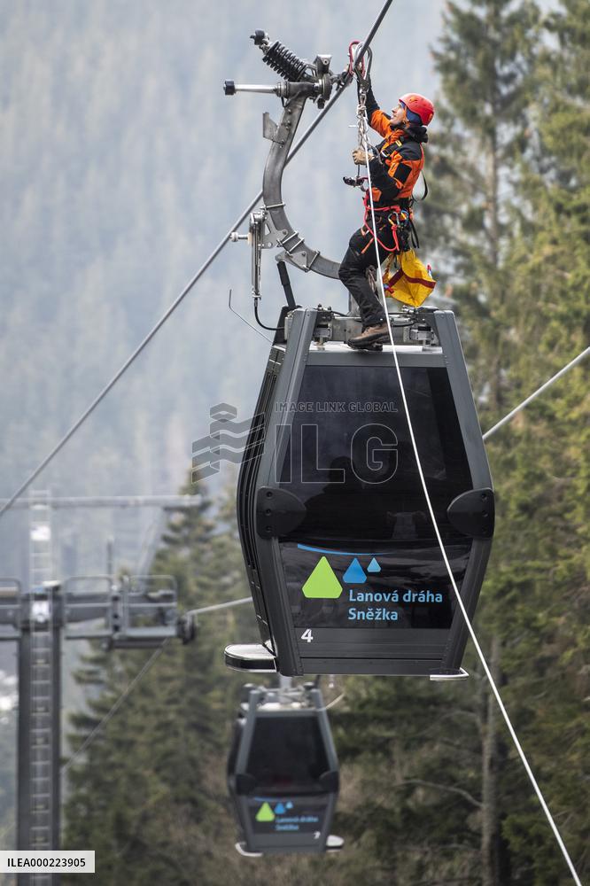joint exercise of Czech and Polish firefighters on chairlift to Snezka Mountain in the Giant Mountains (Krkonose)