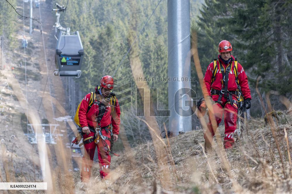 joint exercise of Czech and Polish firefighters on chairlift to Snezka Mountain in the Giant Mountains (Krkonose)