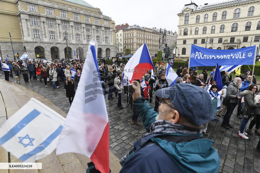 rally protesting and warning against the danger of anti-Semitism, Israeli and Czech flag