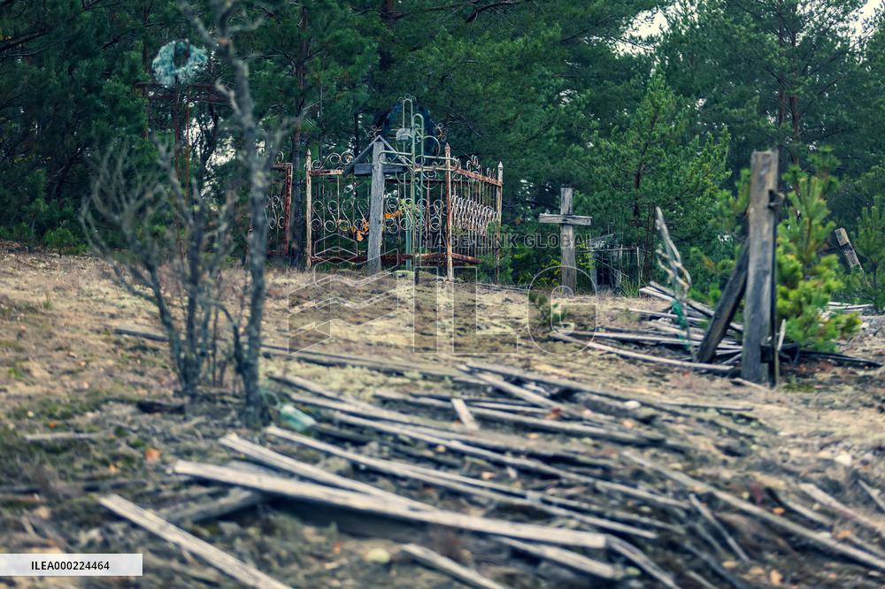 Chernobyl zone, restricted territory, village Krasne, cemetery