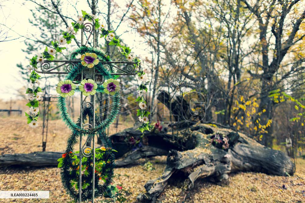 Chernobyl zone, restricted territory, village Krasne, cemetery