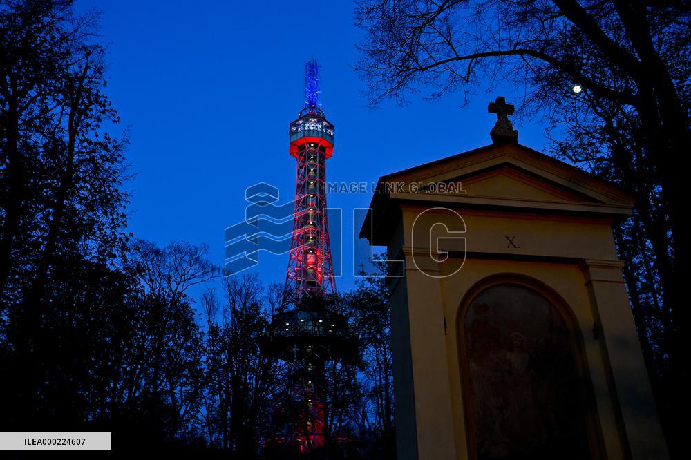 The lookout tower on Petrin hill lit in the French national colours