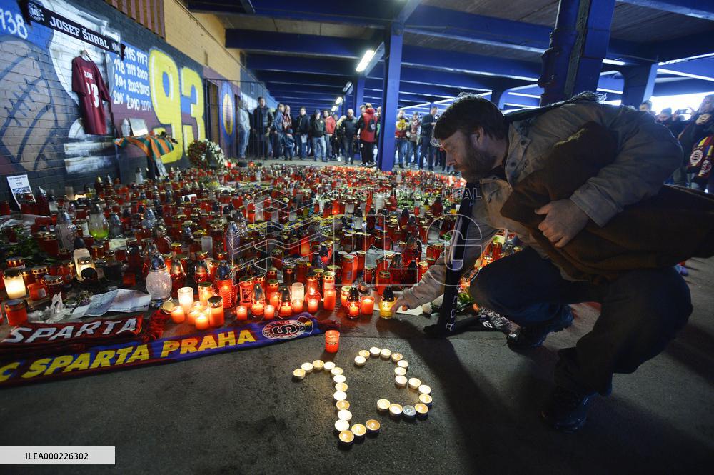 people light candles in memory of Josef Sural