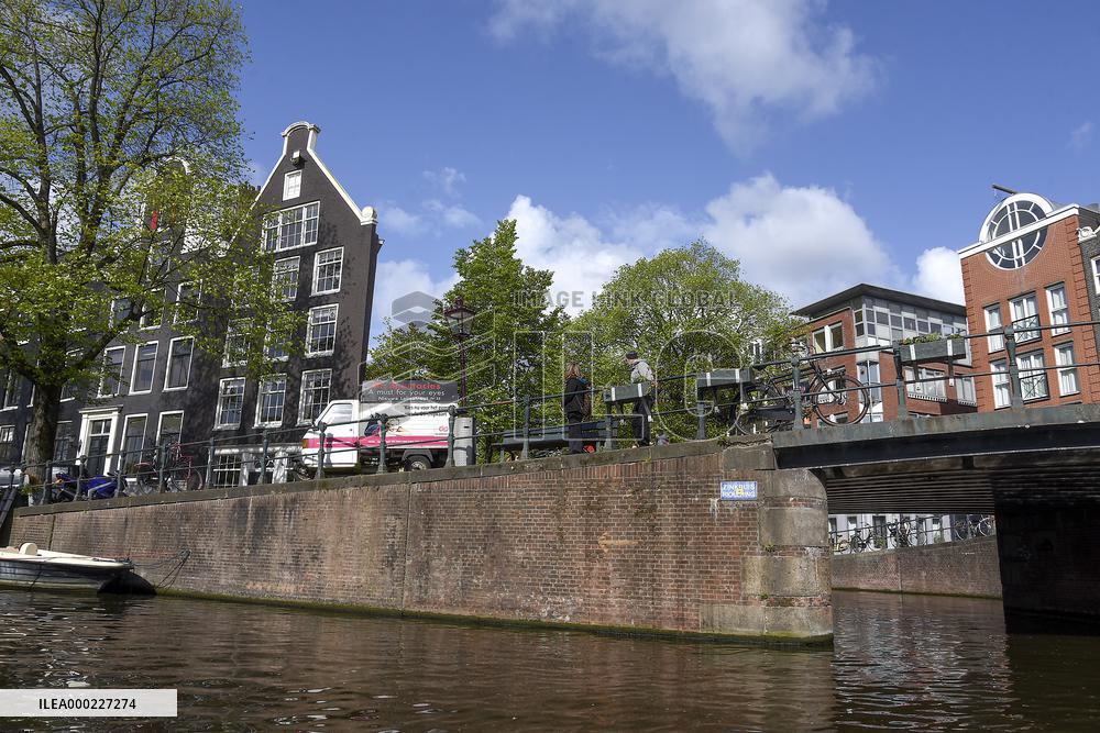 Amsterdam, center of the city, bikes, bicycles, parking, people, tourist, tourists, tourism