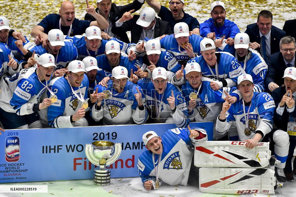 Hockey players of Finland celebrate a victory, gold medal