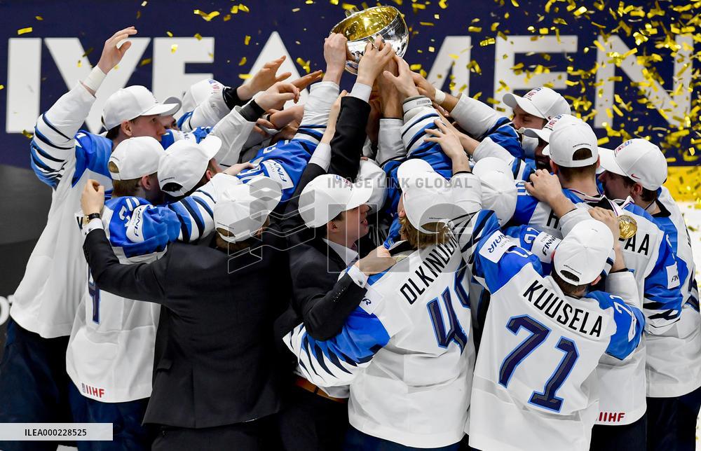 Hockey players of Finland celebrate a victory, gold medal