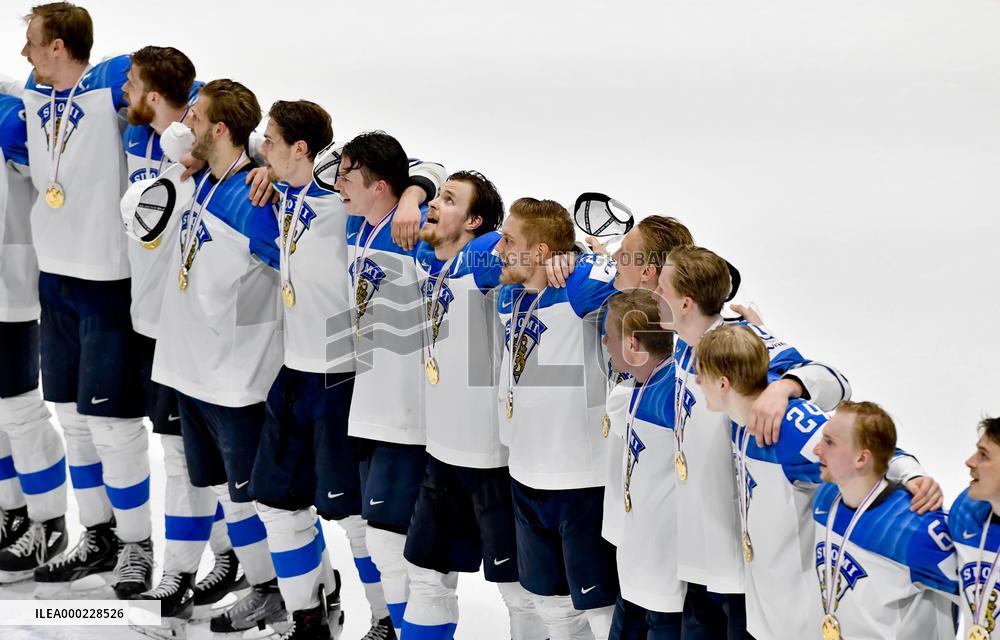 Hockey players of Finland celebrate a victory, gold medal