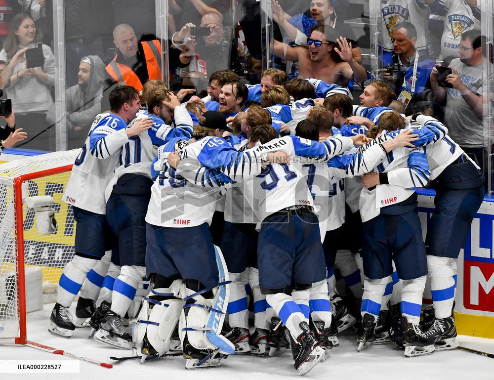 Hockey players of Finland celebrate a victory, gold medal