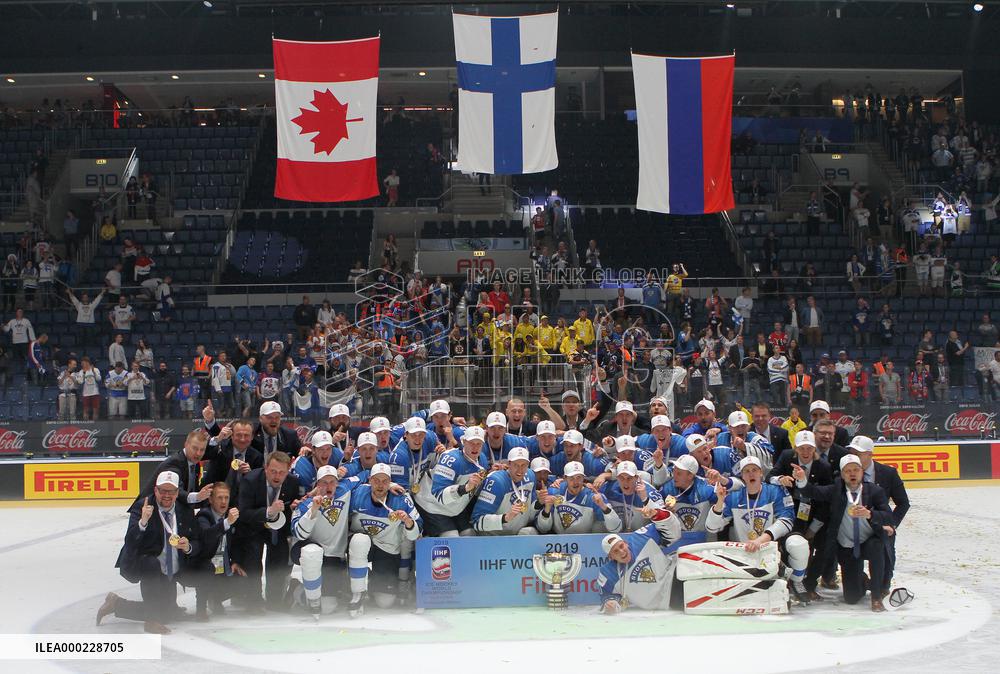Hockey players of Finland celebrate a victory, gold medal