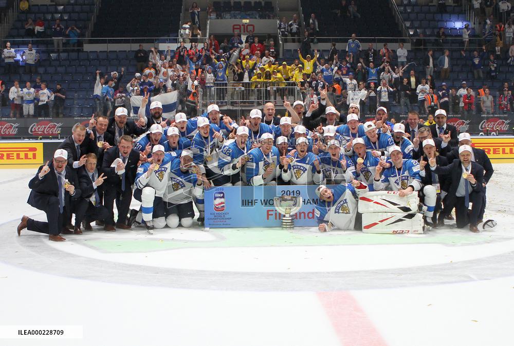 Hockey players of Finland celebrate a victory, gold medal