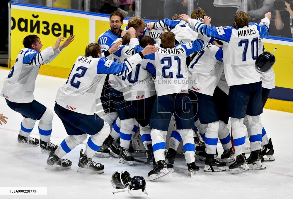 Hockey players of Finland celebrate a victory, gold medal