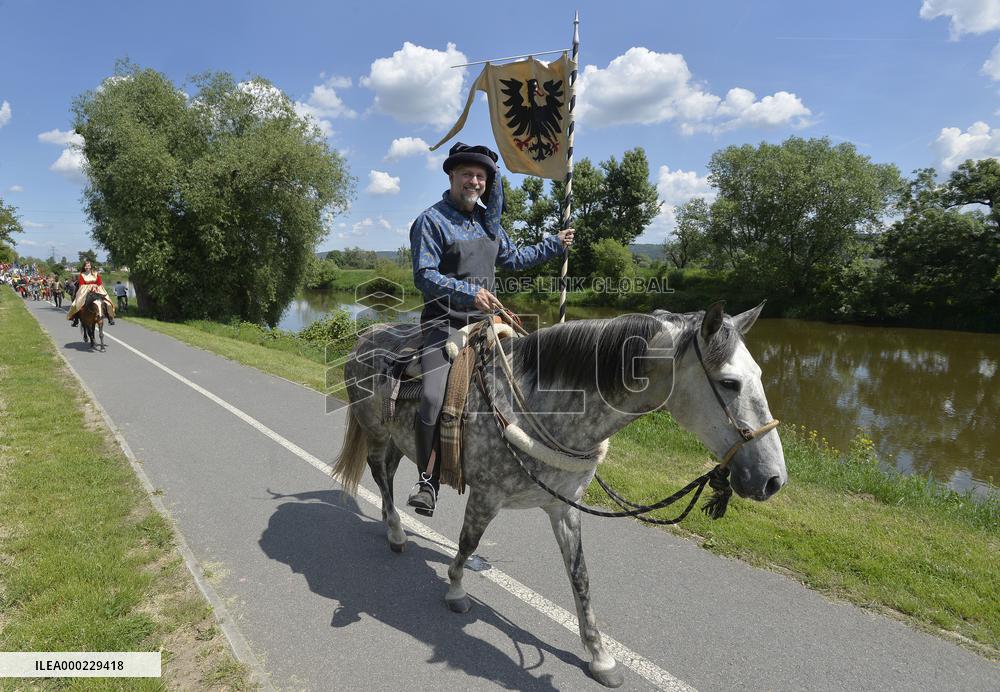 two-day historic royal procession of emperor Charles IV and his suite with crown jewels