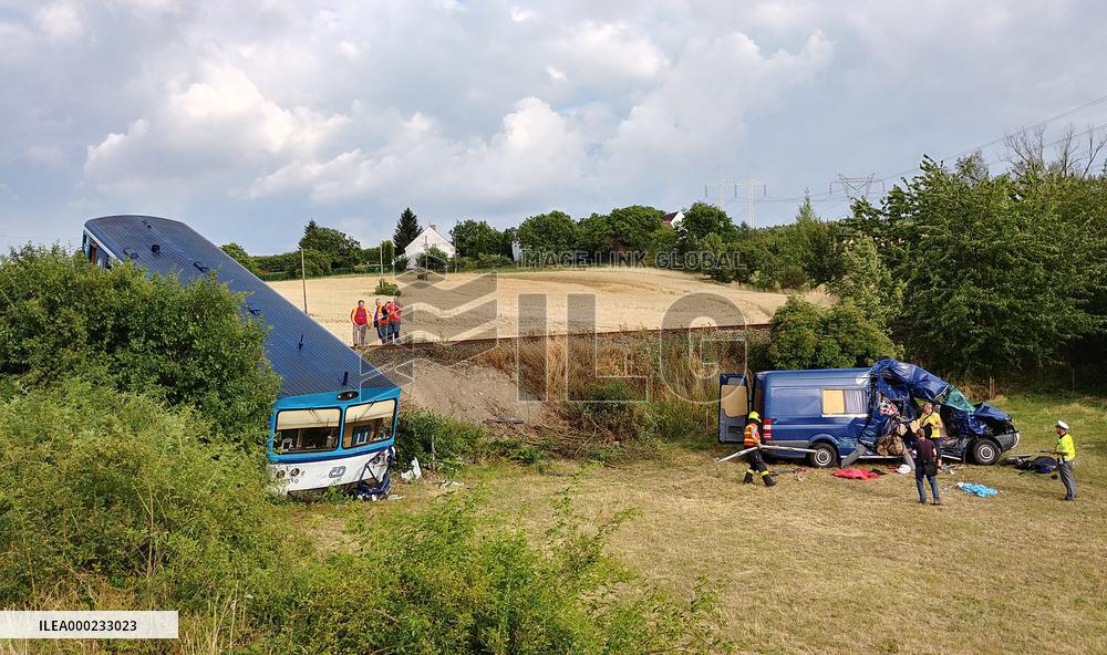 one dies, another seven injured in collision of van with train in Czech Republic
