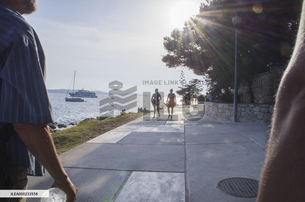 Hvar, promenade, swimming, tourists