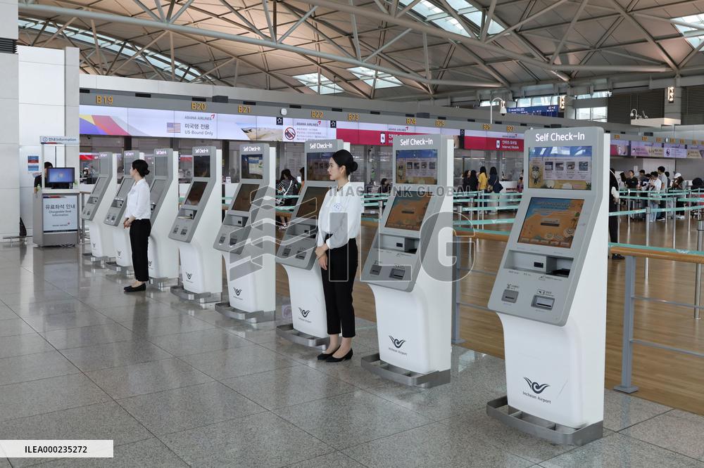 Seoul Incheon Airport check-in assistants