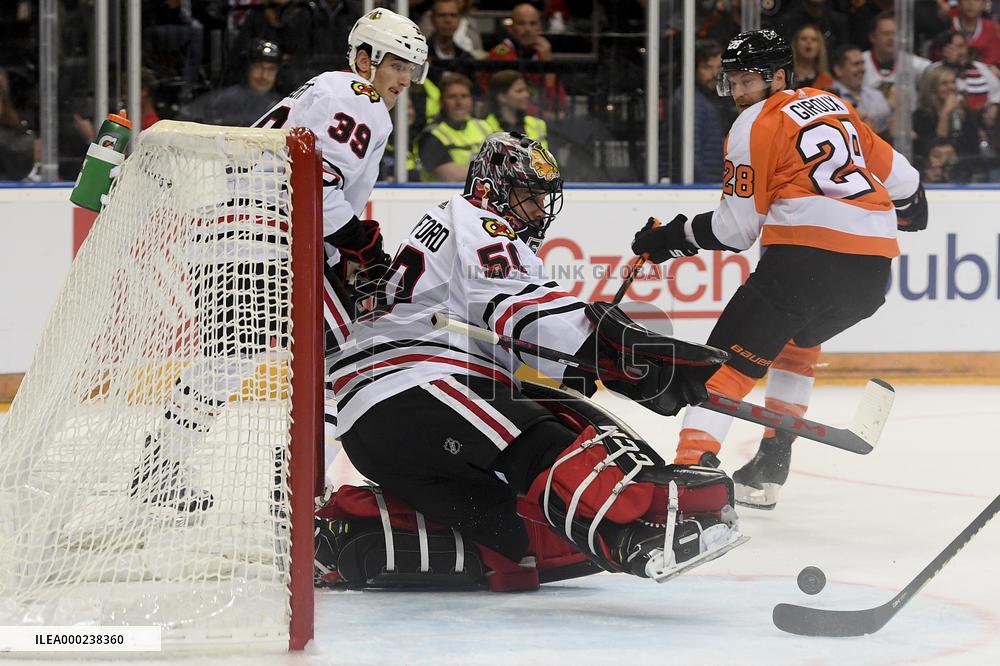 Dennis Gilbert, Corey Crawford, Claude Giroux
