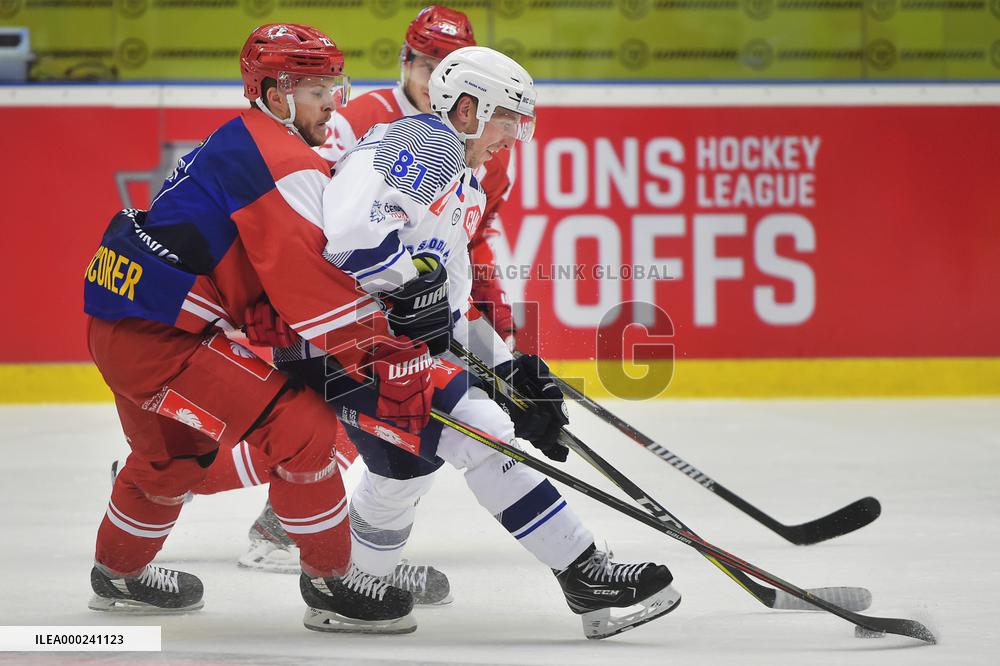 Christoph Bertschy, Jaroslav Kracik, Cory Emmerton