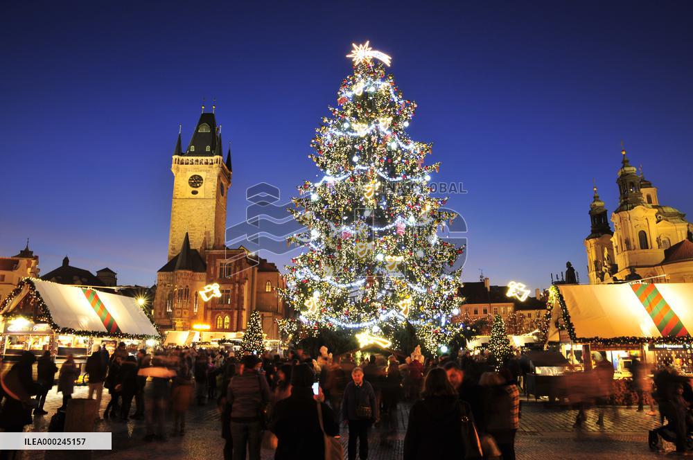 Christmas market and tree at Old Town Square in Prague, Old Town Hall