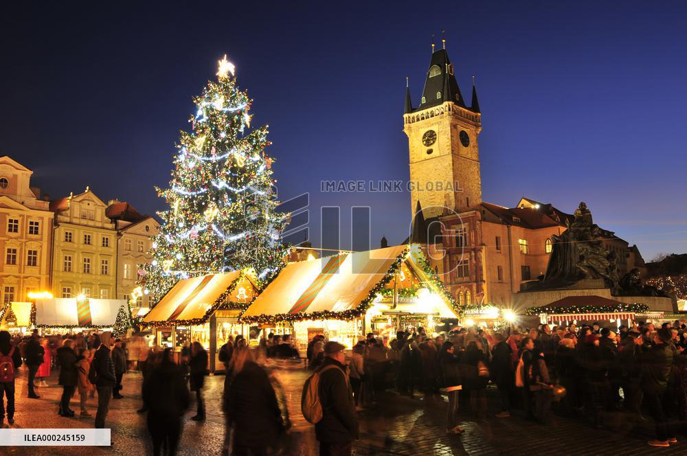 Christmas market and tree at Old Town Square in Prague, Old Town Hall