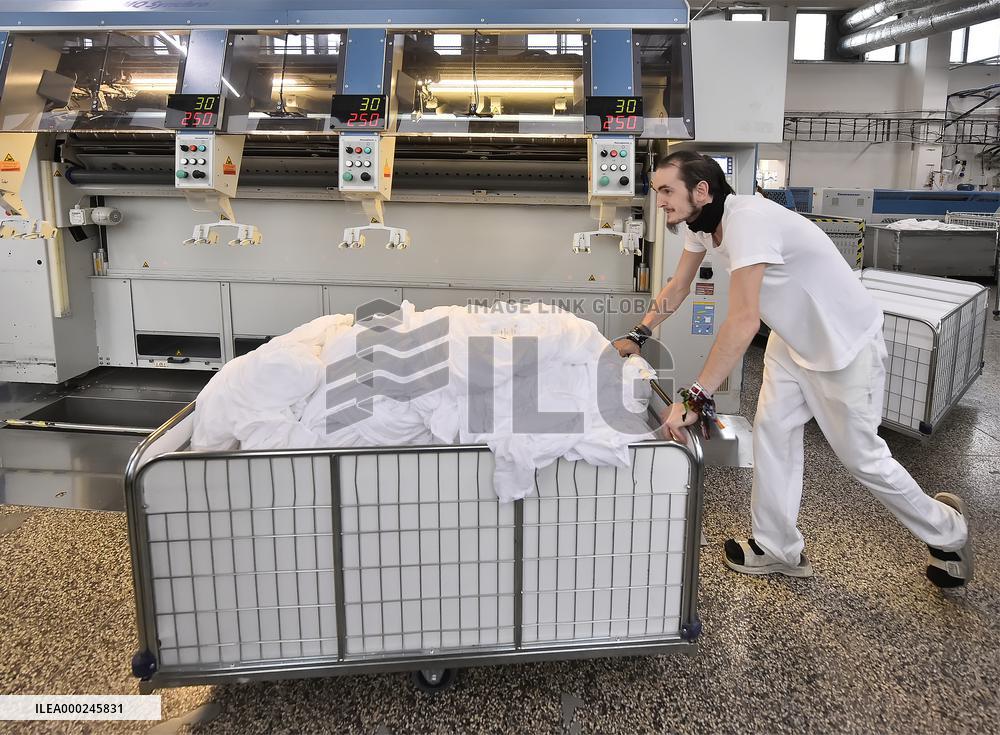 Jihlava Laundry and Cleaning Plant, high capacity ironing line
