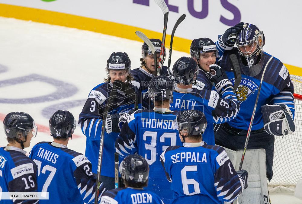 Finland players celebrate the team's 8-1 win
