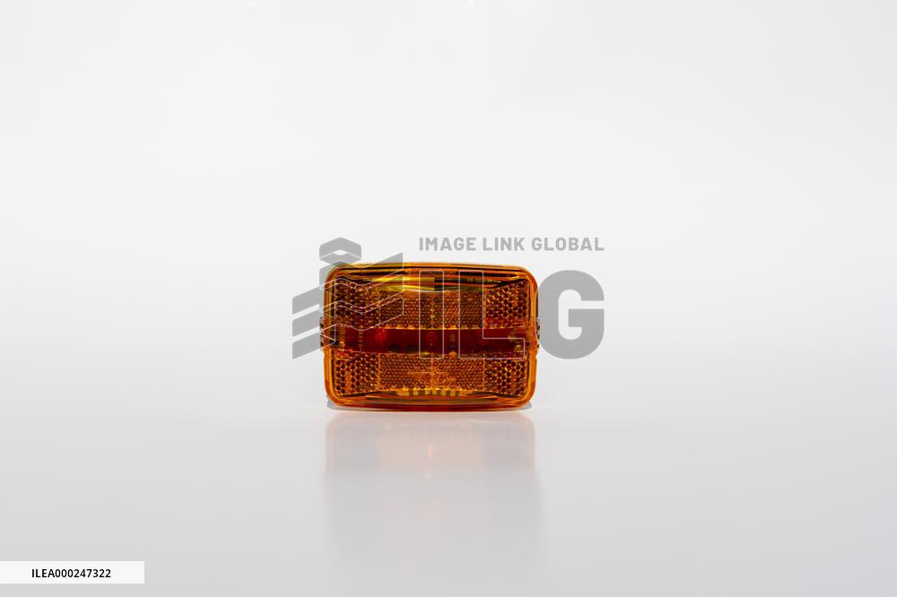 Light, orange reflector on bike