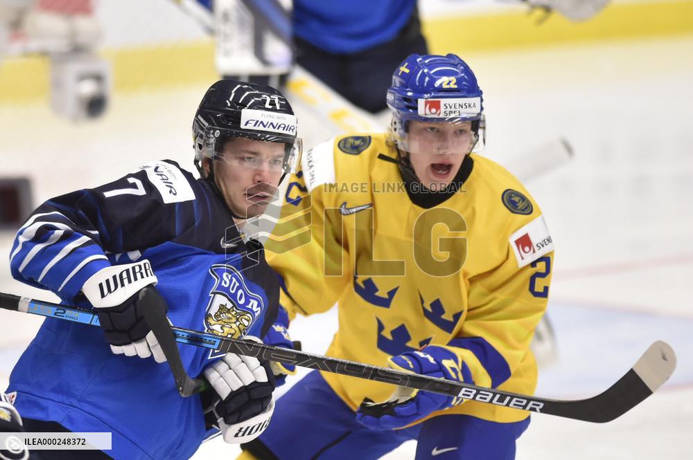 Kristian Tanus, Karl Henriksson