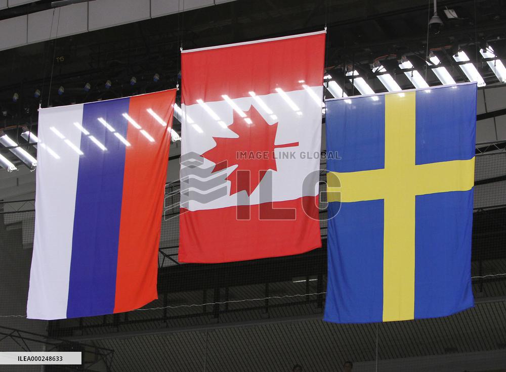 the national flags of Russia, Canada and Sweden