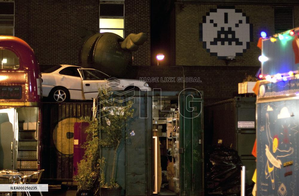 Car cemetery, graffiti, double decker bus, ball