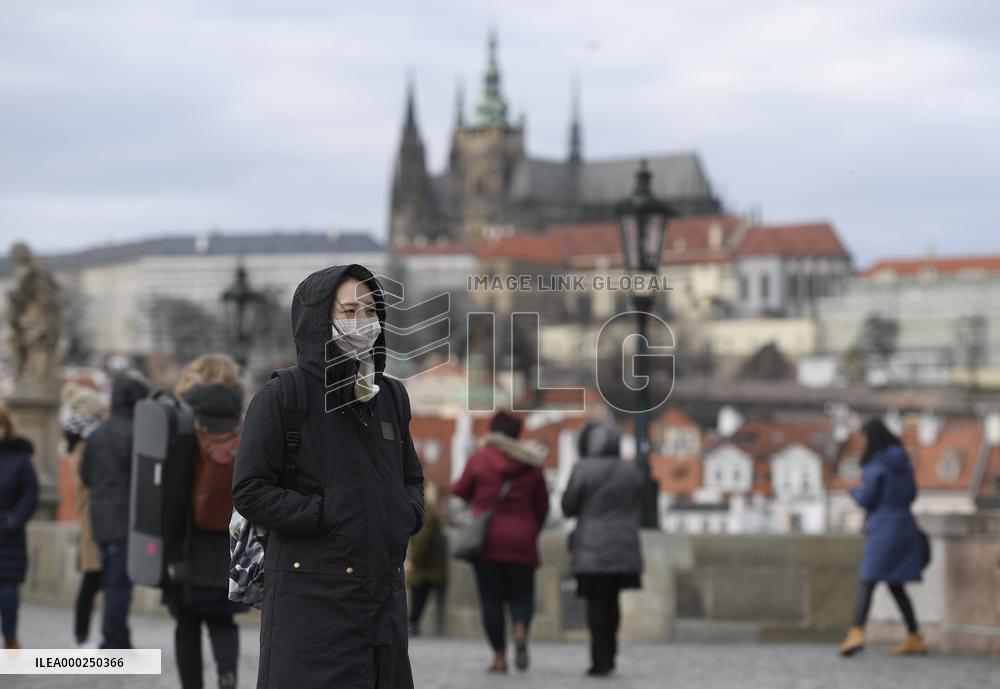 Traveller at the Charles Bridge in Prague