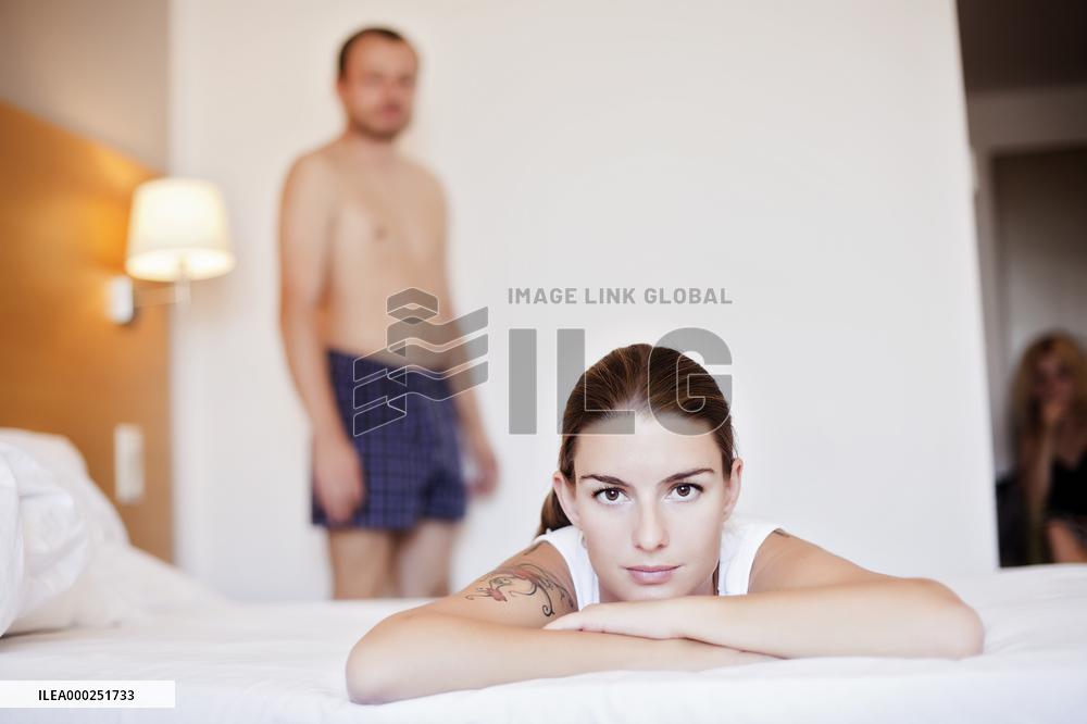 Man, woman, bed