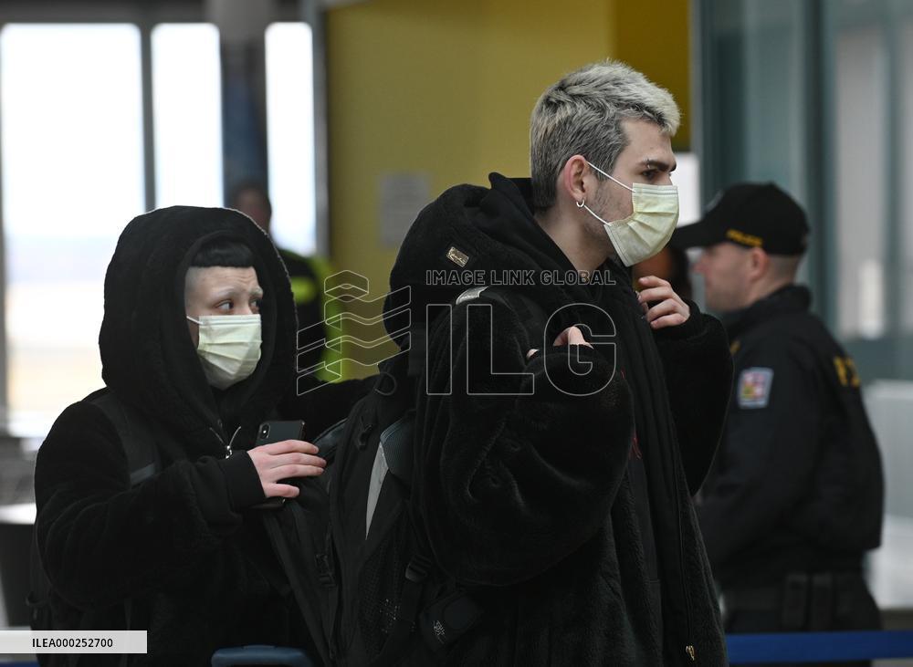 A passenger wearing face mask at the Brno Turany Airport