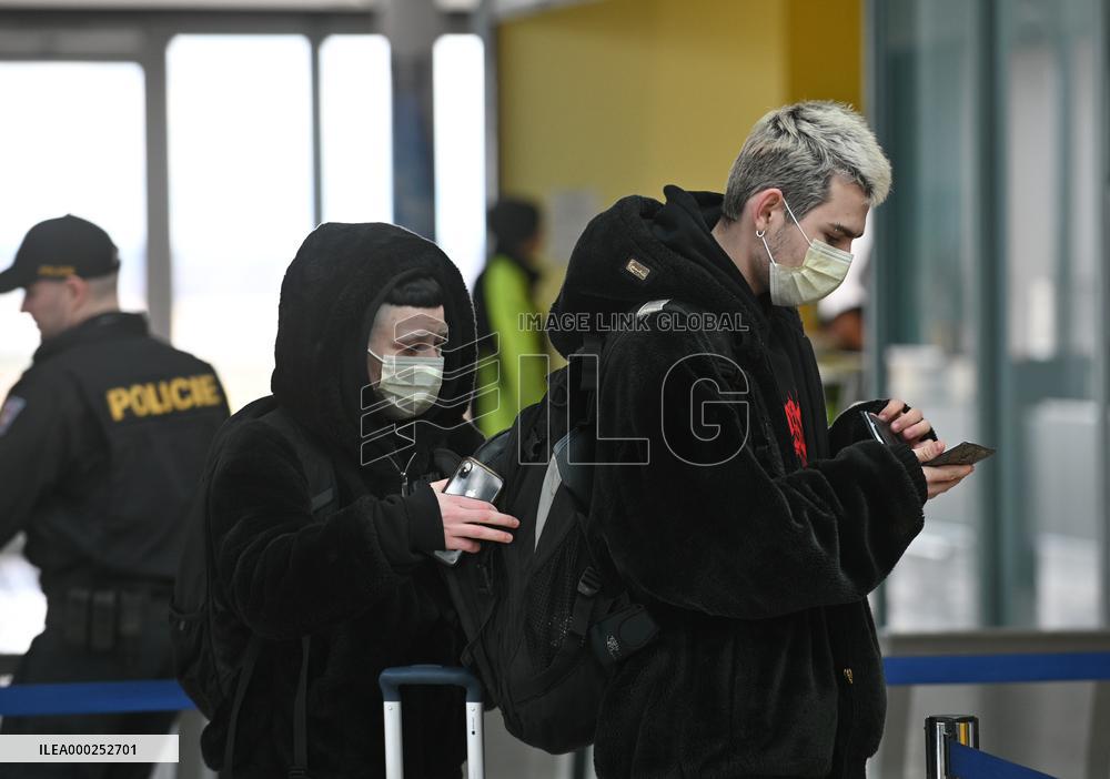 A passenger wearing face mask at the Brno Turany Airport