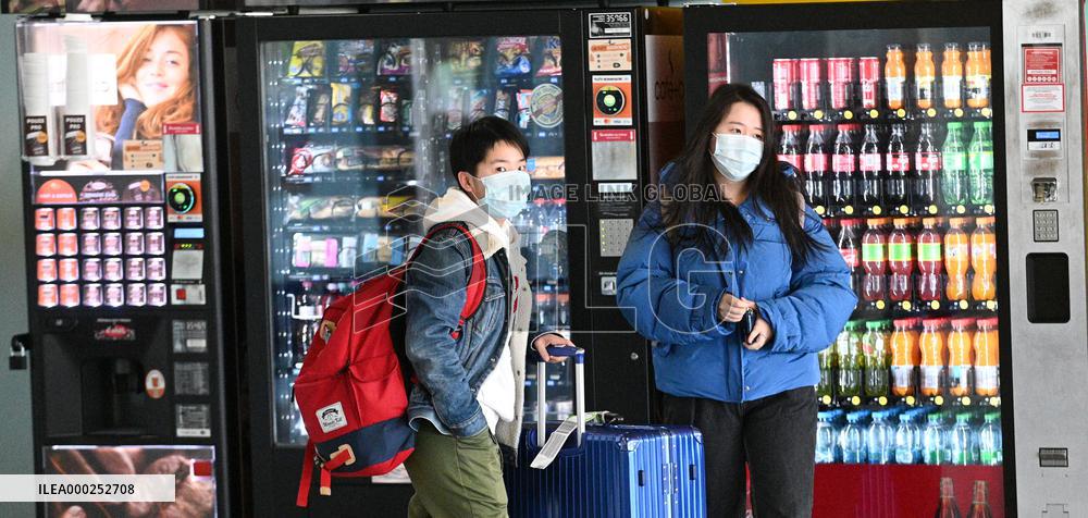 A passenger wearing face mask at the Brno Turany Airport