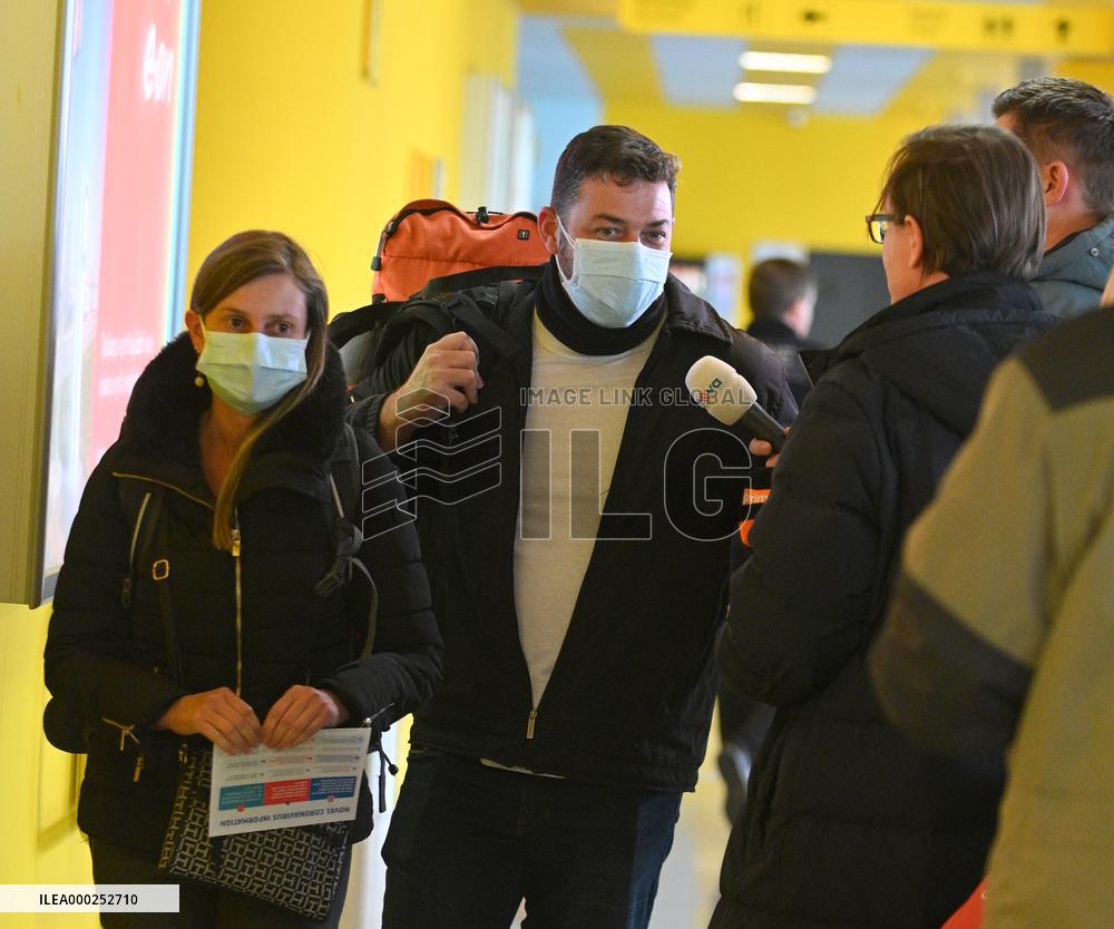 A passenger wearing face mask at the Brno Turany Airport