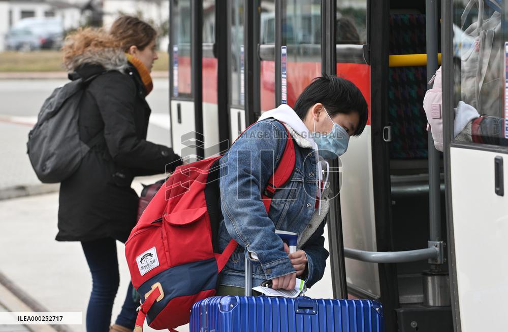 A passenger wearing face mask at the Brno Turany Airport