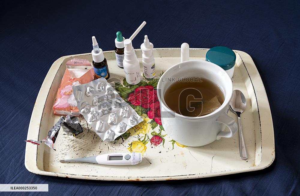 Medicine, pills, thermometer, nose drops, handkerchiefs, tea, flu, cold