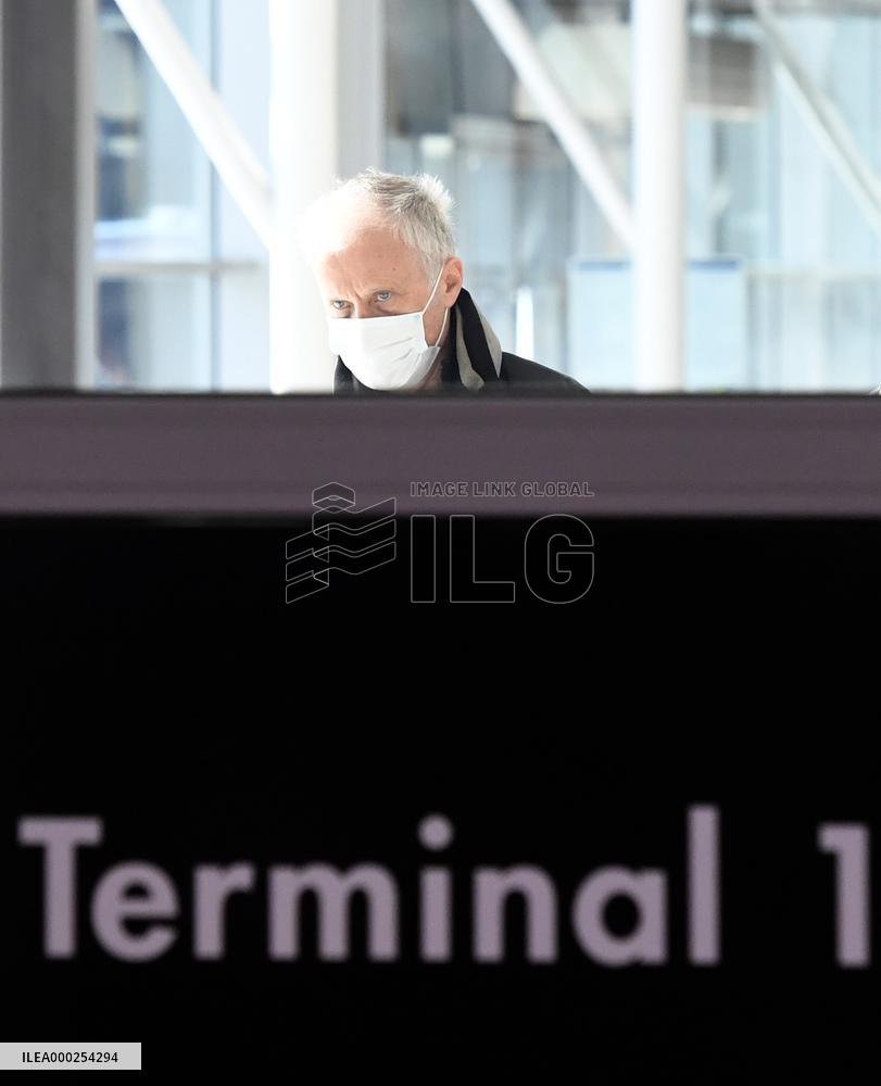 Vaclav Havel Airport Prague, coronavirus, protective medical mask, man