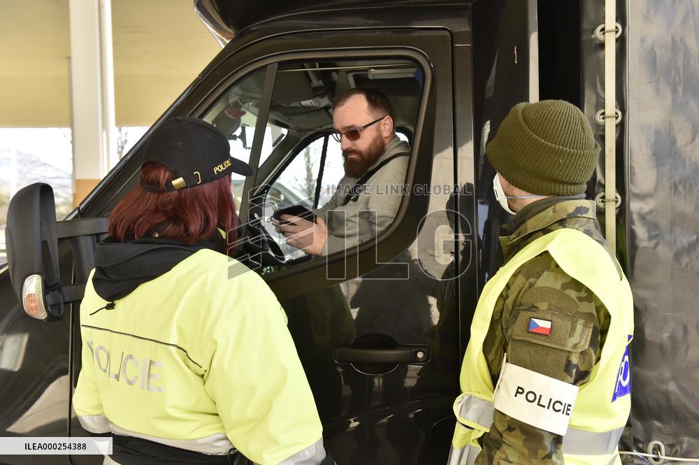 Czech soldiers help police officers guard the Mikulov-Drasenhofen border crossing