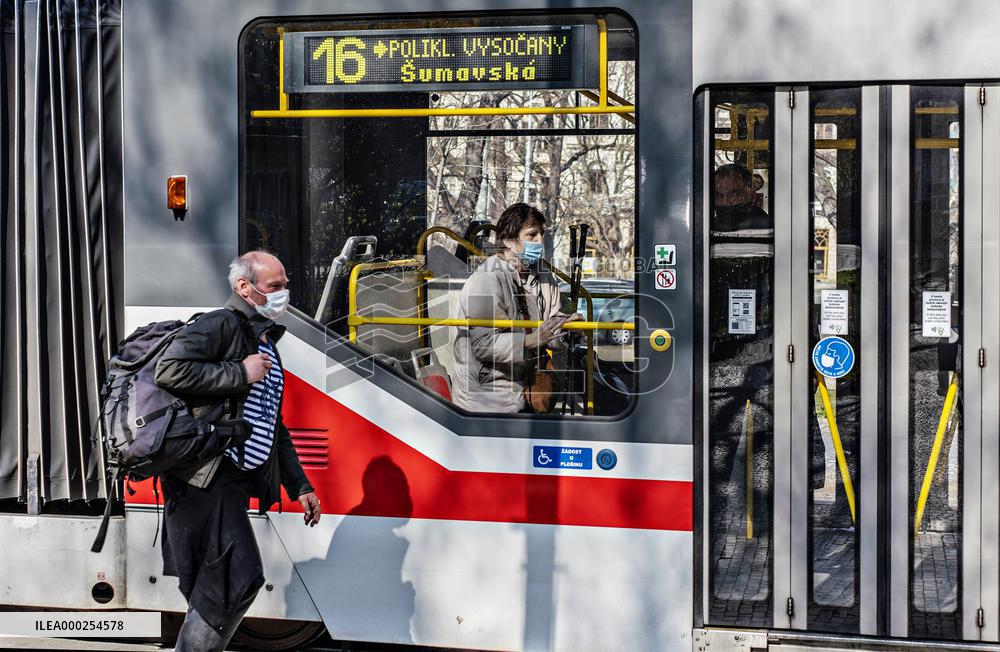 Public transport, Prague, epidemic coronavirus, people, face mask, tram