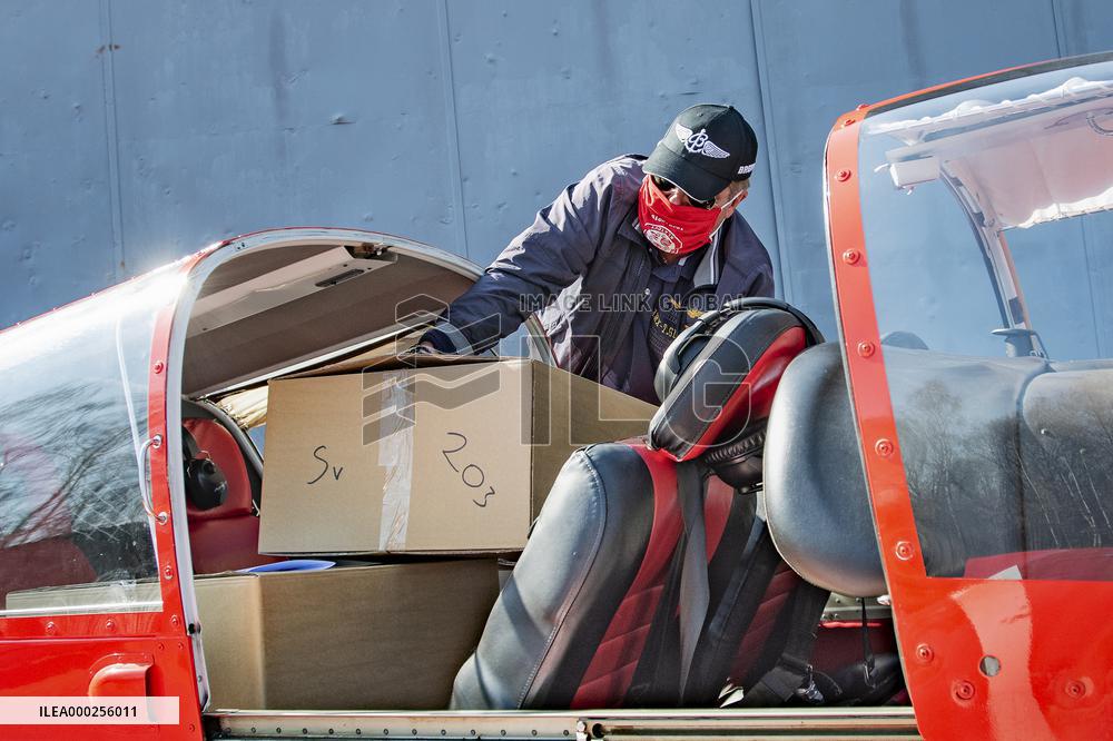 pilot Pavel Kratochvil landed with an aircraft loaded with boxes with masks and respirators, medical supplies