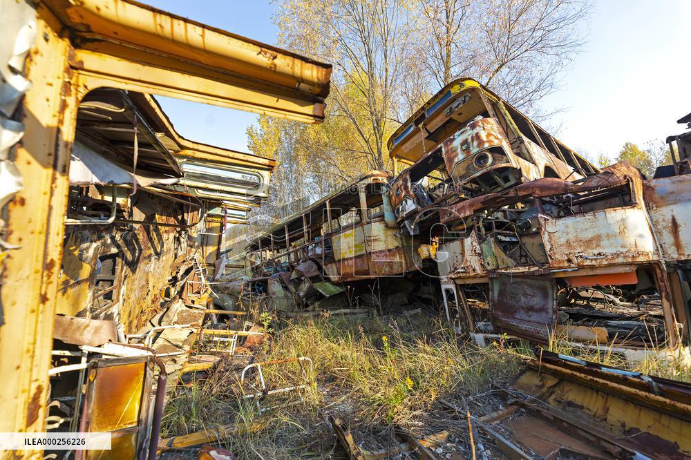 Chernobyl zone, restricted territory, Rasocha a radioactive cemetery of vehicles