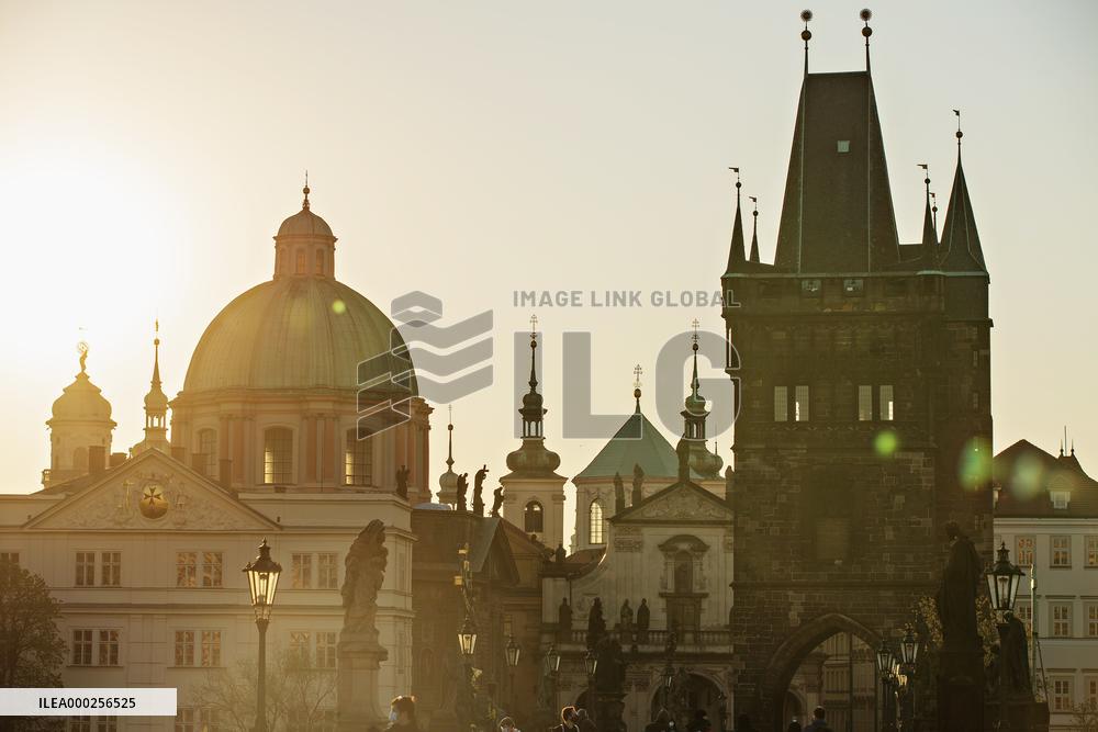 empty Charles Bridge in Prague, sunrise