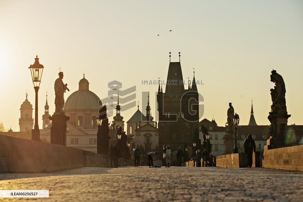 empty Charles Bridge in Prague, sunrise