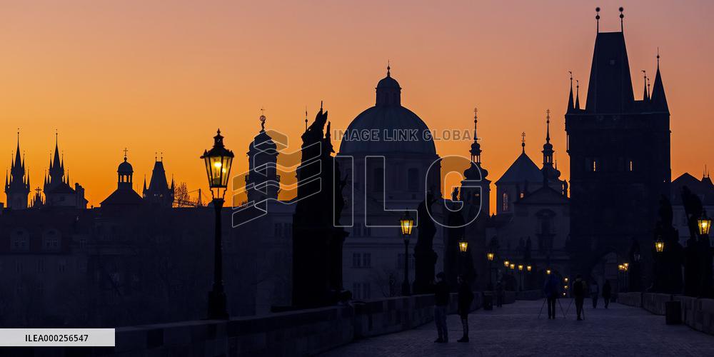 empty Charles Bridge in Prague, sunrise
