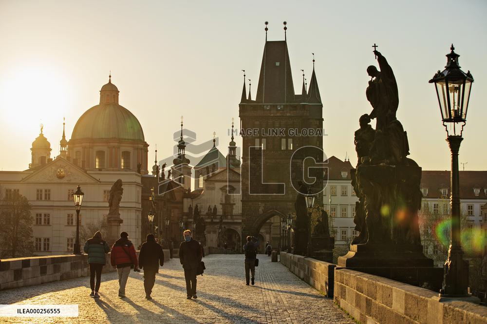 empty Charles Bridge in Prague, sunrise