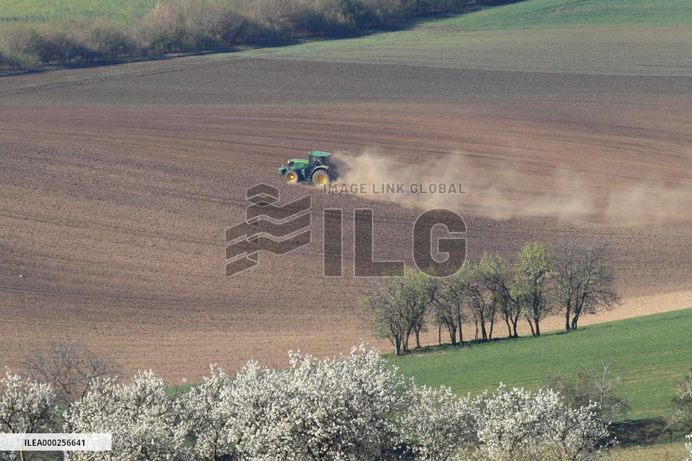 Tractor, dry field, farmer, drought