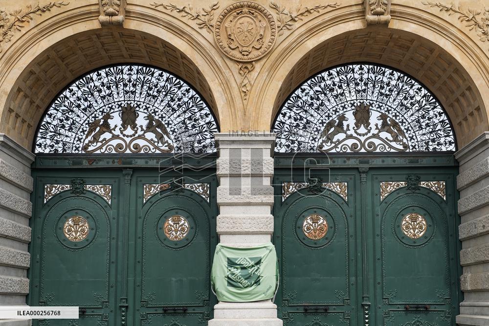 Pilsner Urquell Brewery main gate with a protection face mask