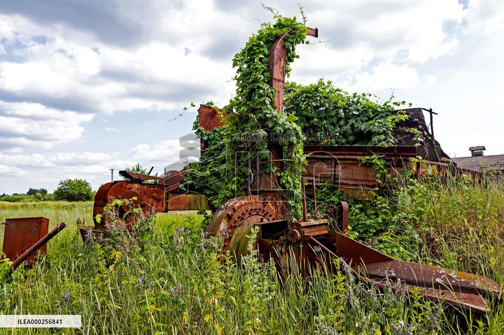 Chernobyl zone, restricted territory, agriculture machinery that were left behind