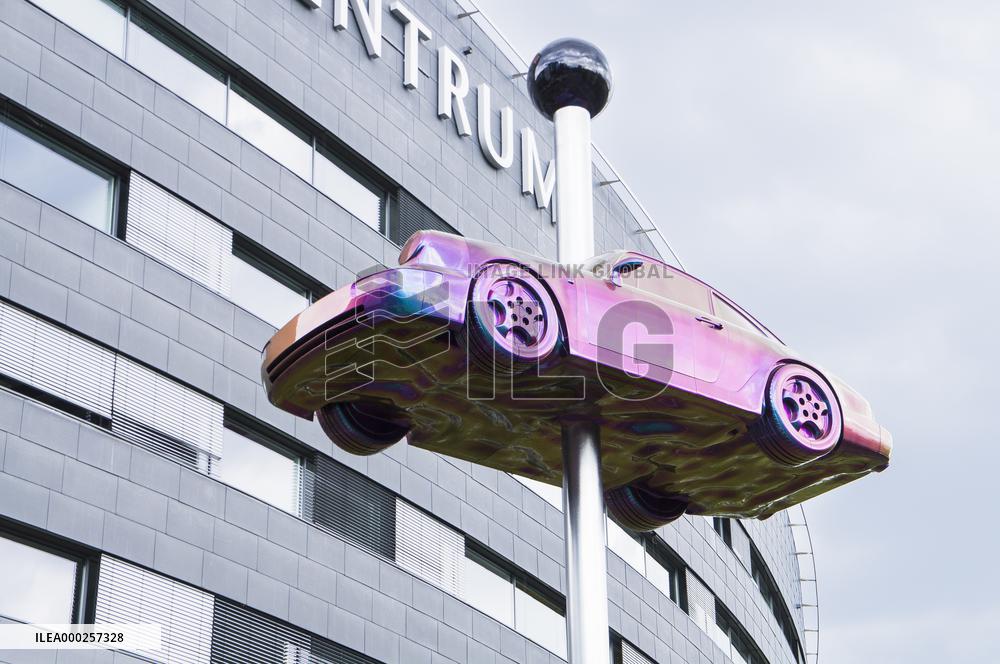 A giant movable car statue Beetle by David Cerny, model Porsche 911